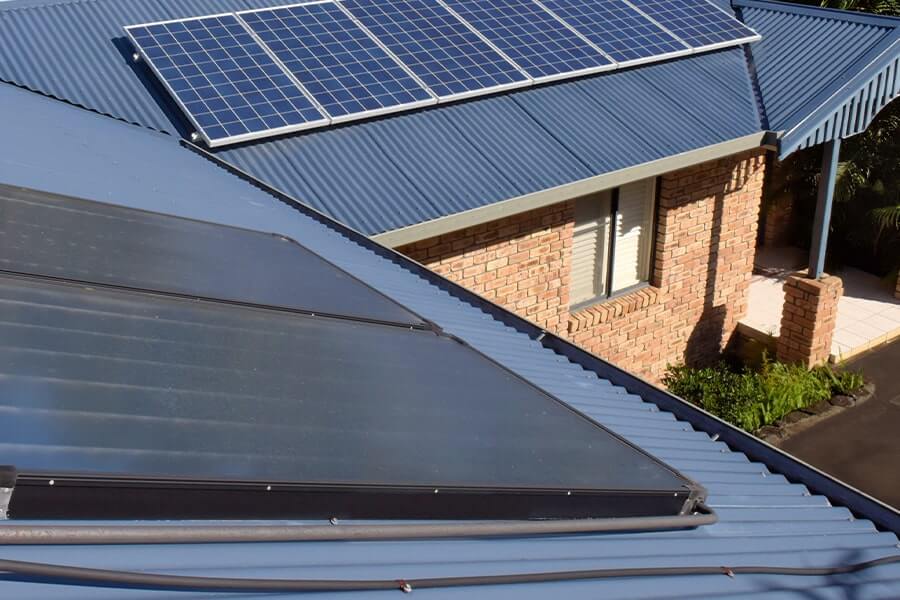 Commercial Solar Thermal and PV System on Blue Roof